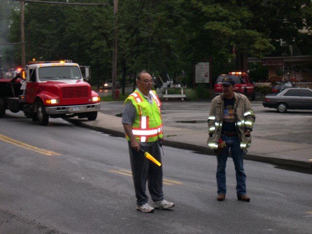 Chief Hecker And Fire Police Member Alimonti Direct Traffic  